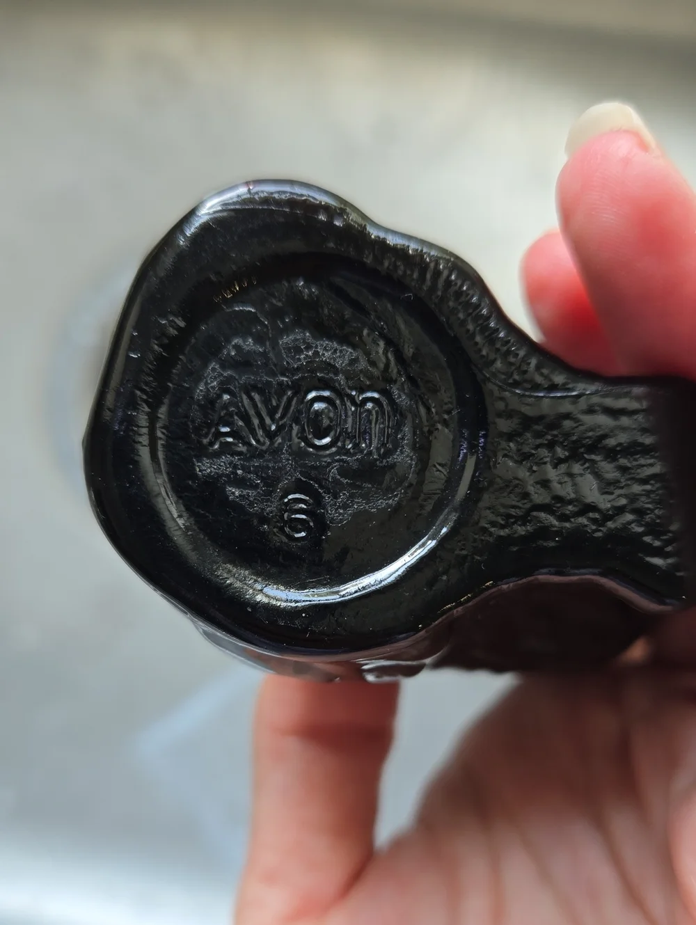Avon vintage black